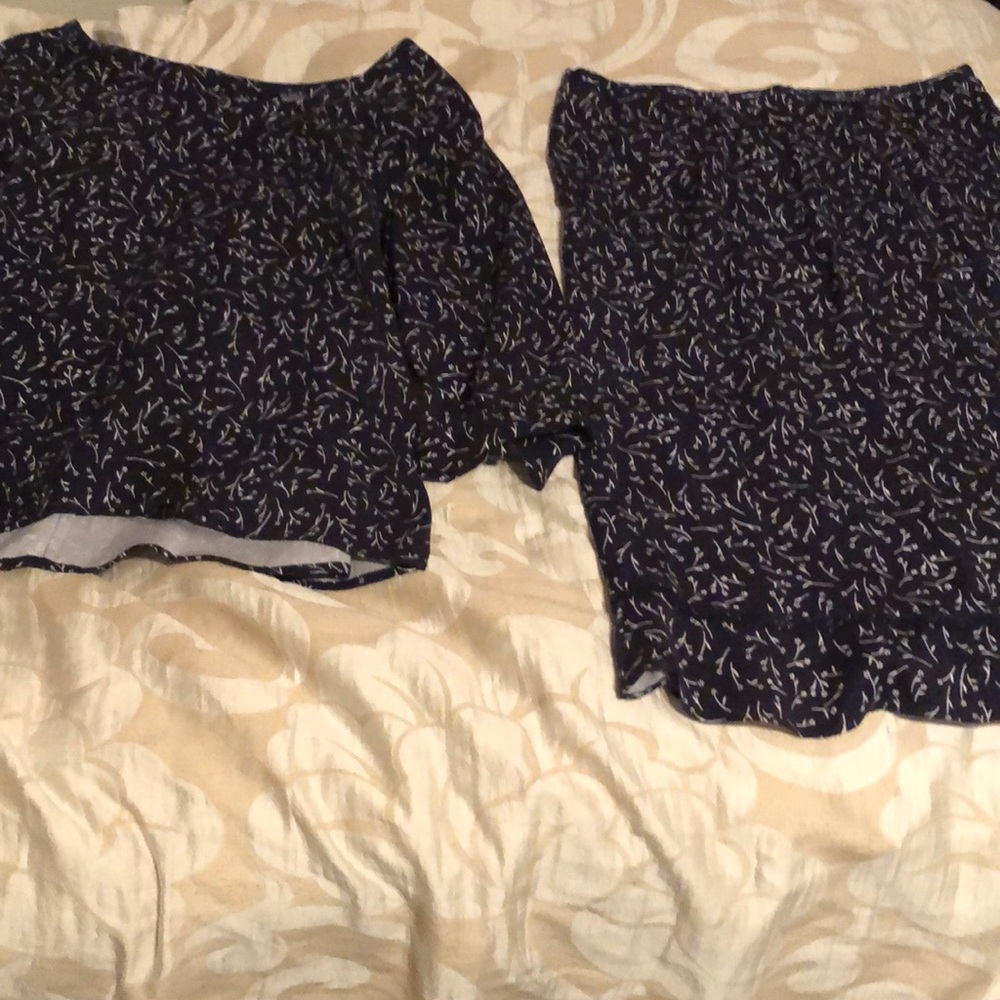 As a button down top and skirt set